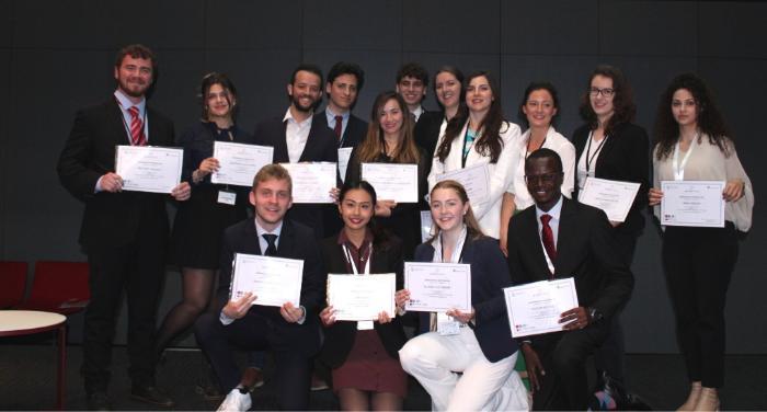 A group photo of students at the Model WTO 2022 conference